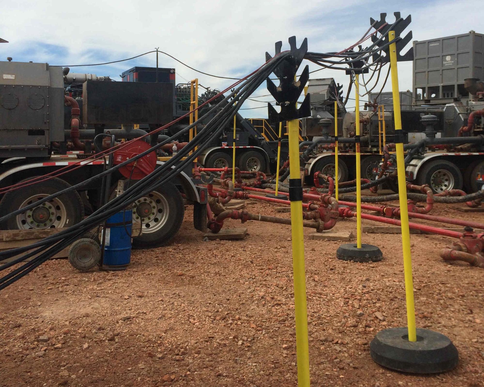 RubberForm portable electric cable support towers elevating power cables above a jobsite