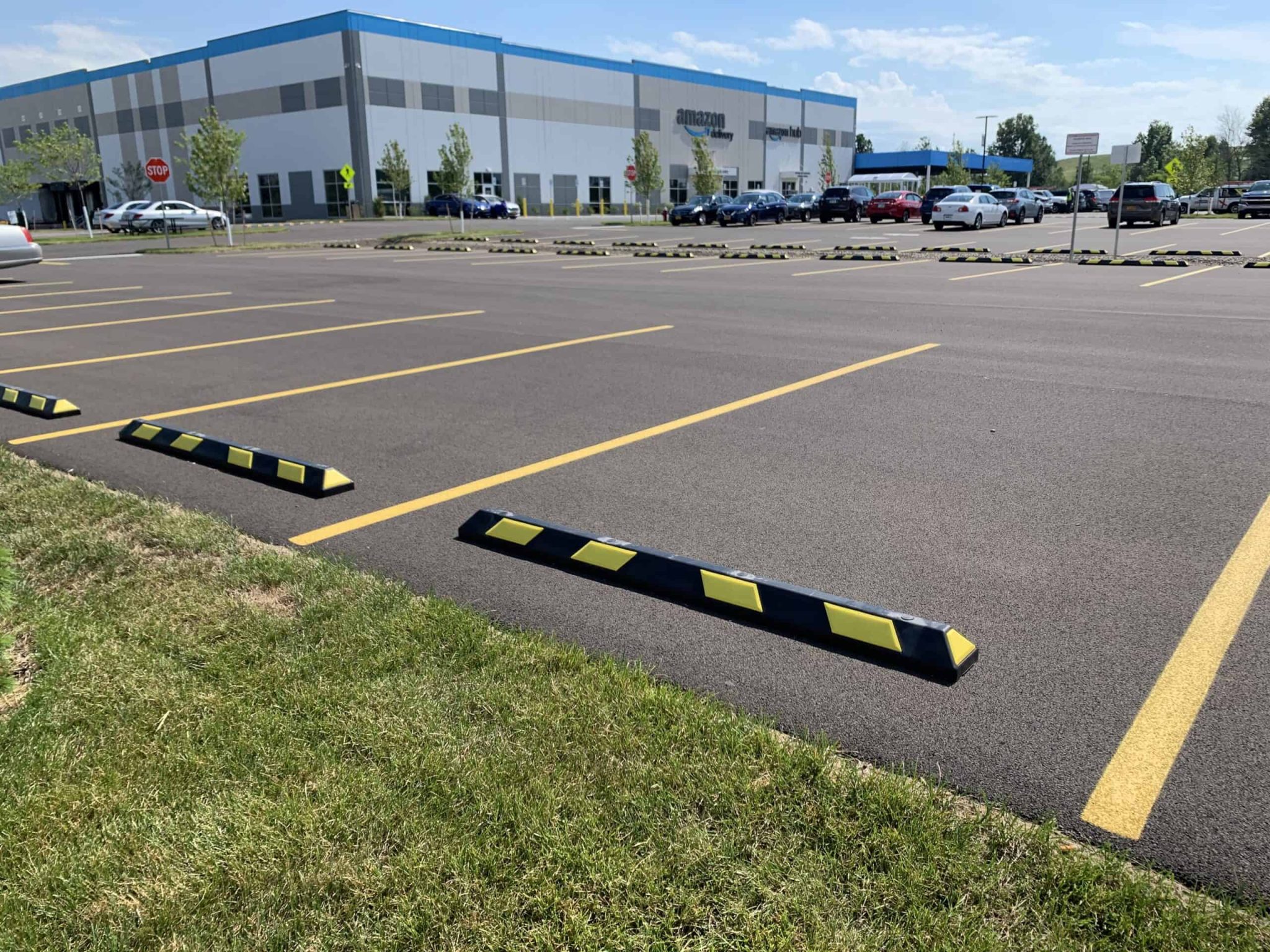 wheel_stops_in_parking_lot-scaled